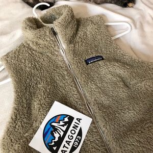 Patagonia women’s fleece vest + sticker